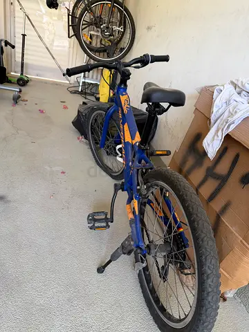 Used blue kids/teen mountain bike - good working condition