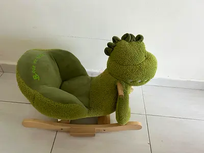 Soft green dinosaur rocking horse for toddlers - good condition