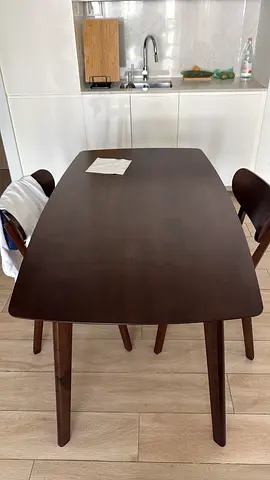 Wooden table and two chairs