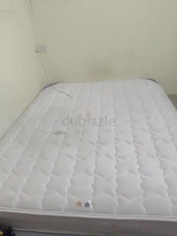 Queen-size mattress in good used condition
