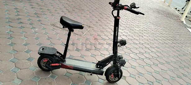 Used Dual-Motor Electric Scooter with Seat - Good Condition