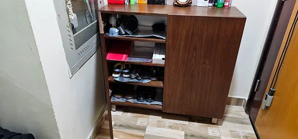 Compact wooden shoe cabinet with storage - good condition