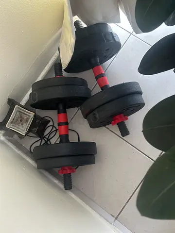 Adjustable Dumbbell Set with Weight Plates and Bars - Good Condition