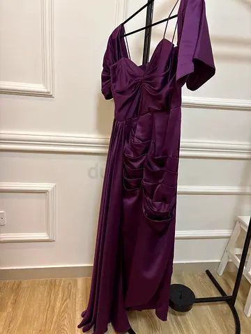 Purple formal evening dress with draped front detail