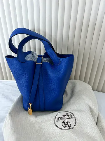 Hermès Picotin Lock 18 bag is crafted from Bleu Royal Clemence leather