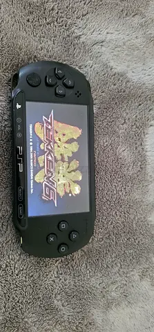 Modded Sony PSP handheld console with charger and AV cable - good working condition