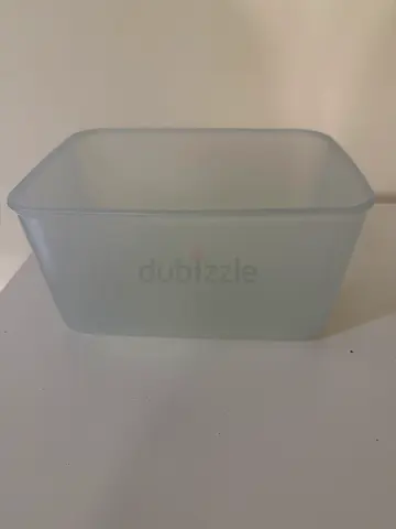 Small translucent plastic storage container - good condition