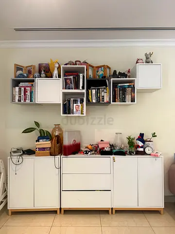 White modular storage cabinet set with wall cube shelves