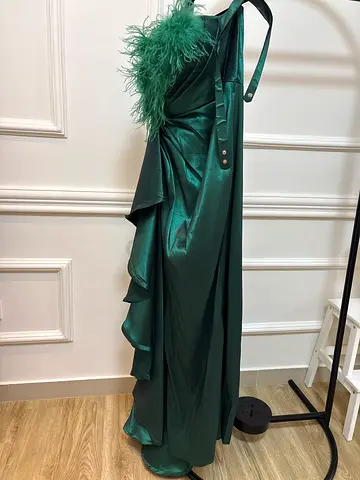 Emerald green satin evening gown with feather trim