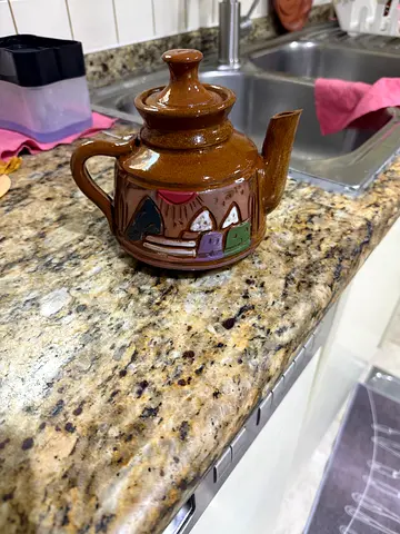 Hand painted and hand made clay teapot.