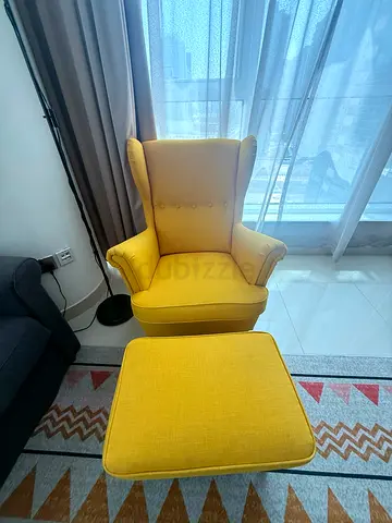 IKEA yellow chair and ottoman