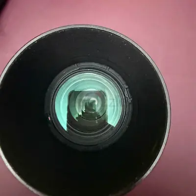 Used Camera Lens (front element shown) - Good Condition