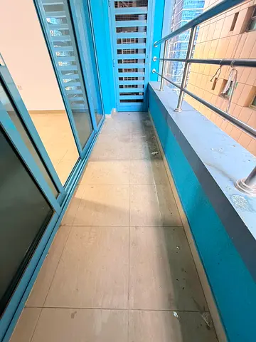 2 bedrooms, a living room, 3 bathrooms, a balcony, a store room, and built-in wardrobes.