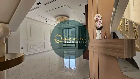 Luxury villa for sale in Al Yasmeen Ajman with modern finishing private swimming pool five master bedrooms majlis living room equipped kitchen maid ro