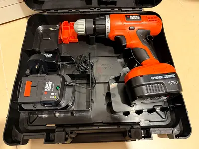 Black  Decker 12V Cordless Drill with Charger and Case - Good Working Condition