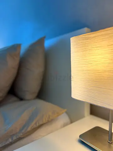 Simple White bed from Ikea with Small Nightstand and lamp very new. Very good condition.