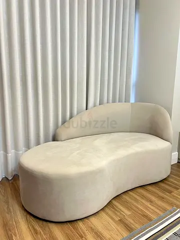 Curved Beige Upholstered Chaise Lounge - Modern Shape