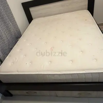 Queen size bed frame with mattress from (THE MATTRESS STORE) and under-bed storage - good condition
