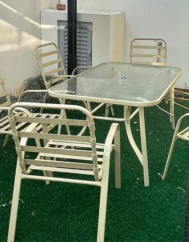Outdoor metal dining table with 6 matching chairs - cream, glass top