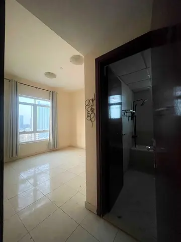 * 🏙️ شقة غرفتين وصالة للإيجار في عجمان – 32,000