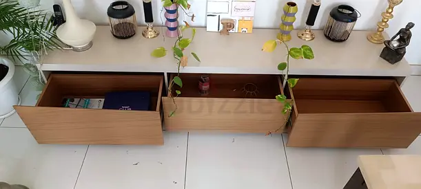 Low-profile 3-drawer TV console / storage unit in light wood