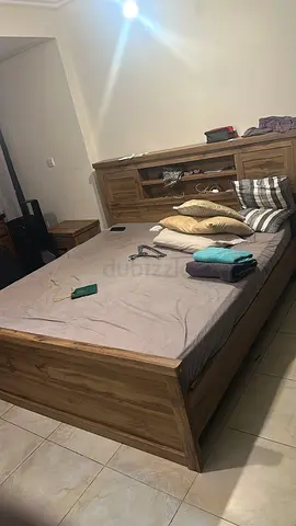 Bed with side table, 2 storage units and center table