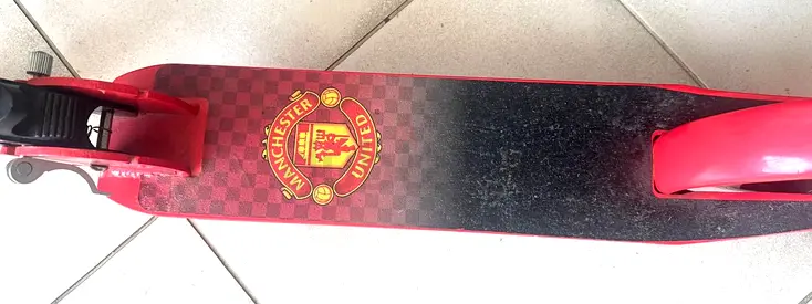 Red Manchester United Kids Kick Scooter, Foldable, Adjustable - Good Condition with HELMET