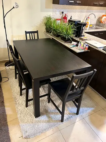 Solid wood black dining table with 4 chairs