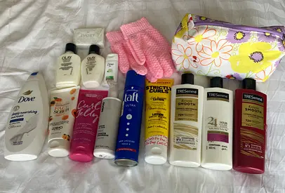 Bundle of hair care and body toiletries with travel pouch