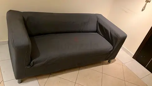 2-seater grey fabric sofa in good condition