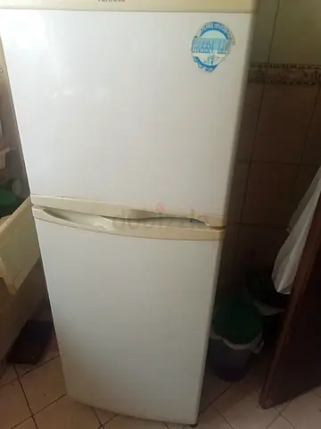 White two-door refrigerator - good working condition