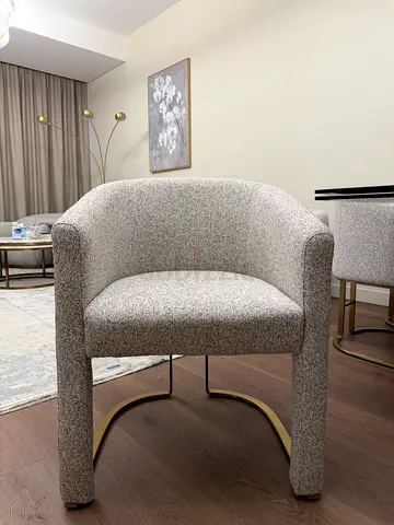 Light Grey Upholstered Accent Chair with Curved Brass Legs