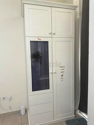 White freestanding 2 wardrobe with drawers and glass panel. Side units not included.