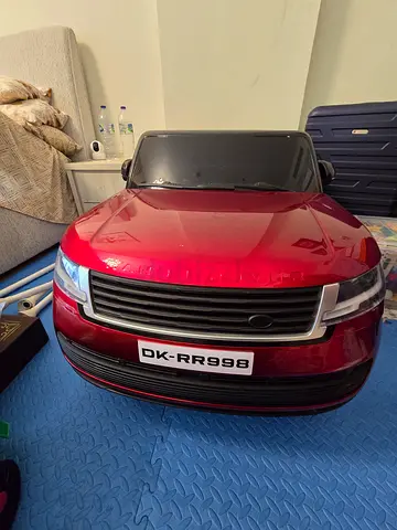 Red ride-on toy car (childrens electric ride-on) - Good condition