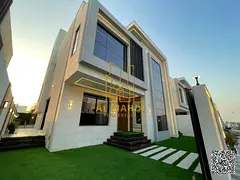 Villa for sale in Al Zahia, two floors and a roof with a swimming pool. Registration fees, electrici