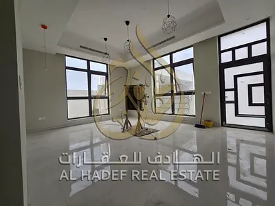 The ground floor comprises two majlis (formal sitting rooms) with washrooms and two bathrooms, a large living room, a master bedroom with built-in wa