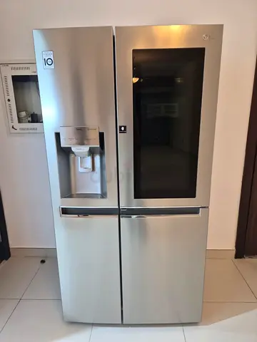 Spacious Side-by-Side Refrigerator - Good Condition