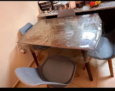 Wooden dining table with 4 modern chairs (good condition)