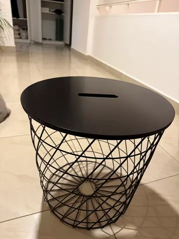 2 Small round side tables with red wire base and gray top and black wire base and black top