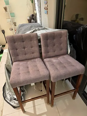 A pair of fabric bar stools high quality