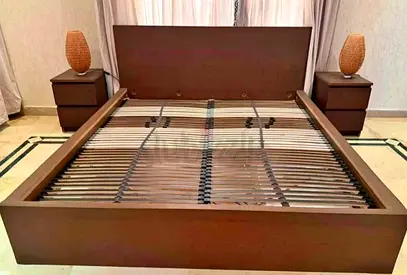 ikea malm king bed with ikea firm mattress   having 2 storage units under the bed