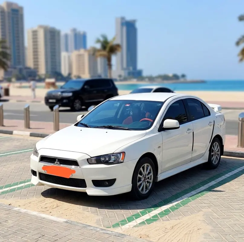 Mitsubishi Lancer 2012 — photo 1 of 7