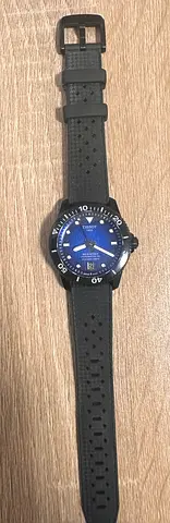 Tissot Seastar 1000 Powermatic  Mens blue dial sporty wristwatch with black rubber strap