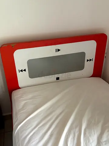 Red and white bed with matress - used