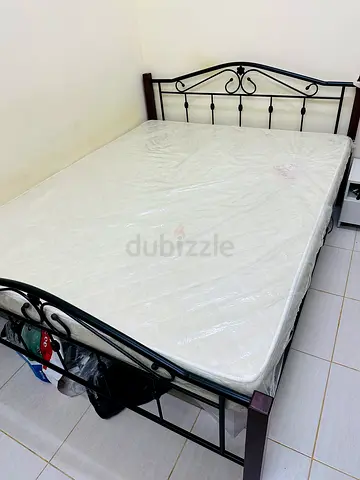 Double Metal Bed Frame with New Unopened Mattress — Excellent Condition