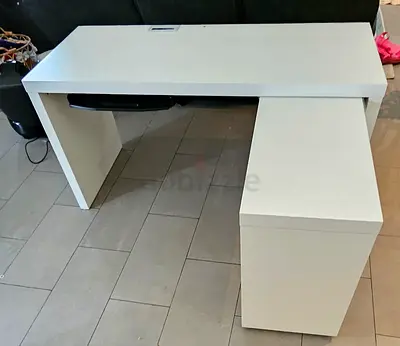Ikea desk with pull out section, keyboard tray, and cable pass through