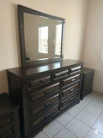 Solid wood 9-drawer dresser with mirror and matching 2 nightstands (2 drawers each)