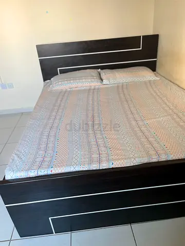 Home center queen size bed with medicated mattress for sale.