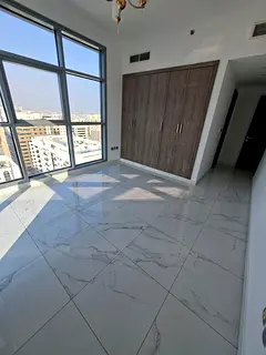 For rent in Sharjah – Al Majaz 1 A nice apartment – first tenant, 2 bedrooms and a living room,