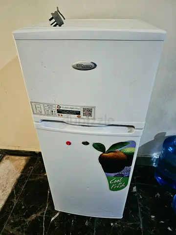 Used single-door refrigerator with top freezer - working condition